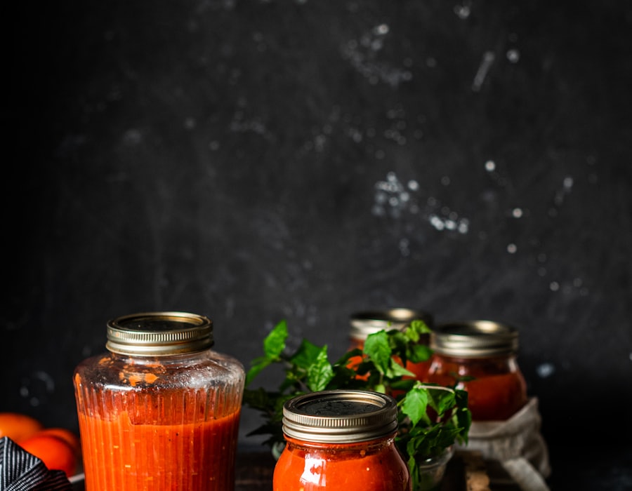 Preserving jars filled with tomato sauce